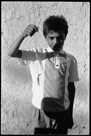 Kurdish boy with pet scorpion, Samsat, Turkey 1970.